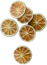 Load image into Gallery viewer, Dried lime slices on a white background