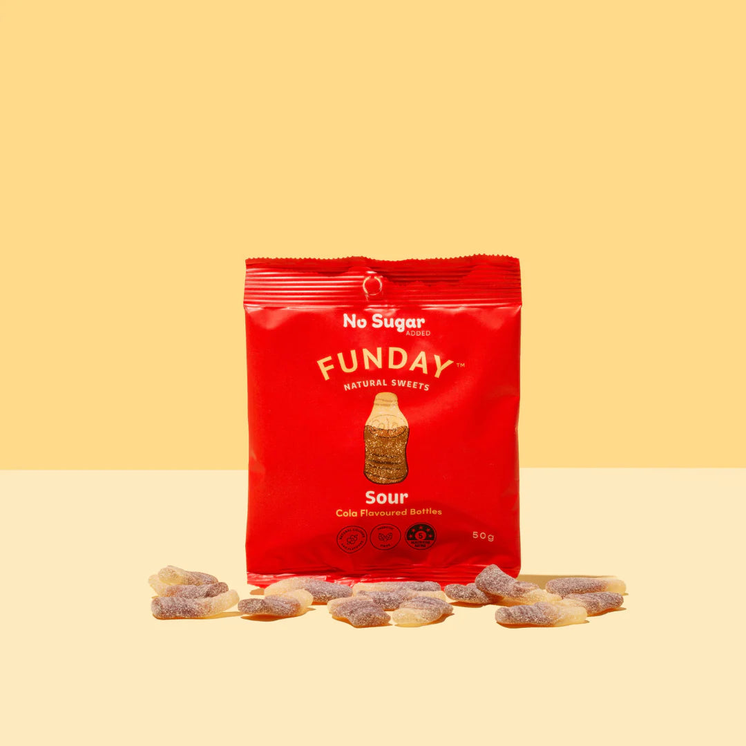 Load image into Gallery viewer, Red bag of Funday Sour Cola Flavoured bottles natural sweets on a beige background