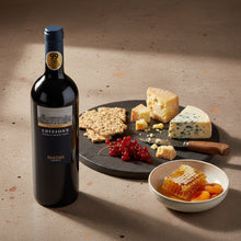 Load image into Gallery viewer, A bottle of Farnese Fantini Edizione Cinque Autoctoni red wine and cheese platter
