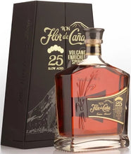 Load image into Gallery viewer, A bottle of the luxurious Flor de Cana Centenario 25YO Single Estate Nicaraguan next to its handsome gift box