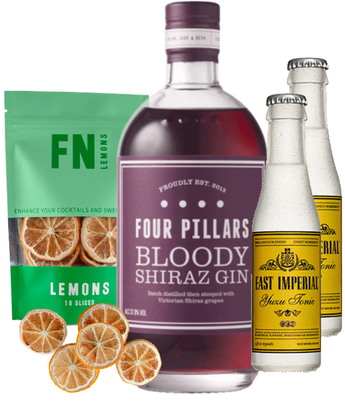 Bottle of Four Pillars Bloody Shiraz Gin with a pouch of lemons and two bottles of tonic water on a white background.