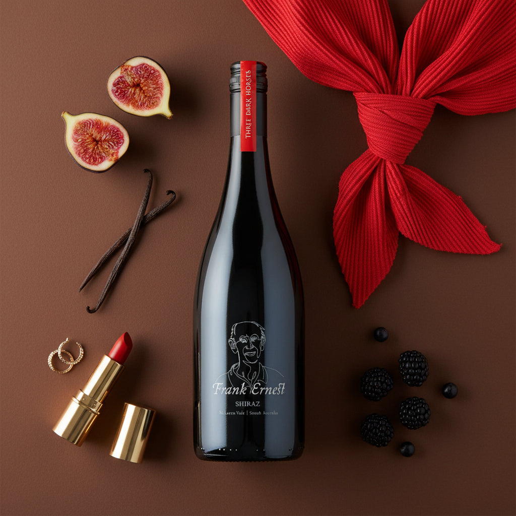 Load image into Gallery viewer, Frank Ernest Shiraz red wine bottle next to a red lipstick and red scarf