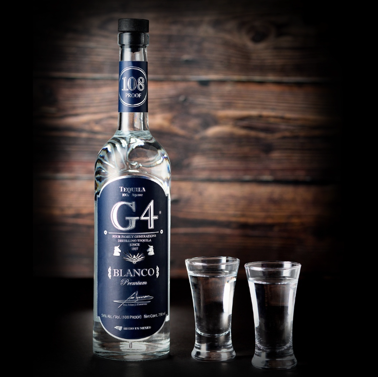 Load image into Gallery viewer, A bottle of G4 Blanco Tequila next to two small sipping glasses