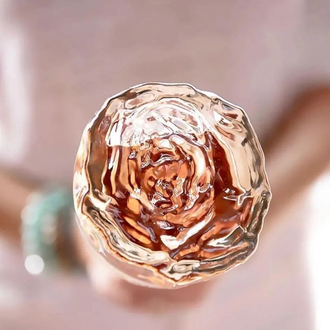 Load image into Gallery viewer, the bottom of a bottle of Gerard Bertrand shaped as a rose