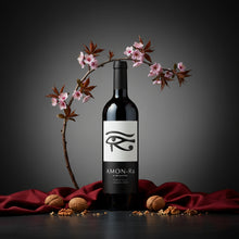 Load image into Gallery viewer, Glaetzer-Amon-Ra-Barossa-Shiraz wine bottle labeled &#39;Amon-Ra&#39; with cherry blossoms and walnuts on a dark background