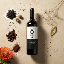 Load image into Gallery viewer, A bottle of Glaetzer-Barossa-Valley-Bishop-Shiraz wine on a textured surface with spices and flowers.