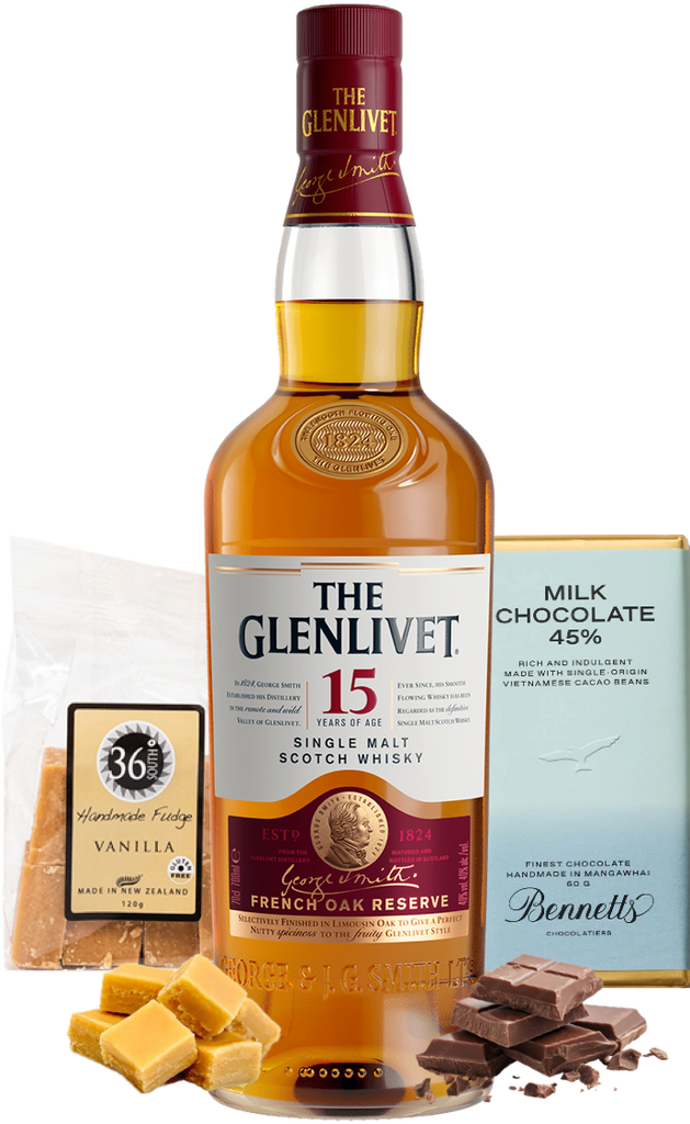 Bottle of The Glenlivet 15-year-old single malt Scotch whisky with chocolate and fudge on a white background