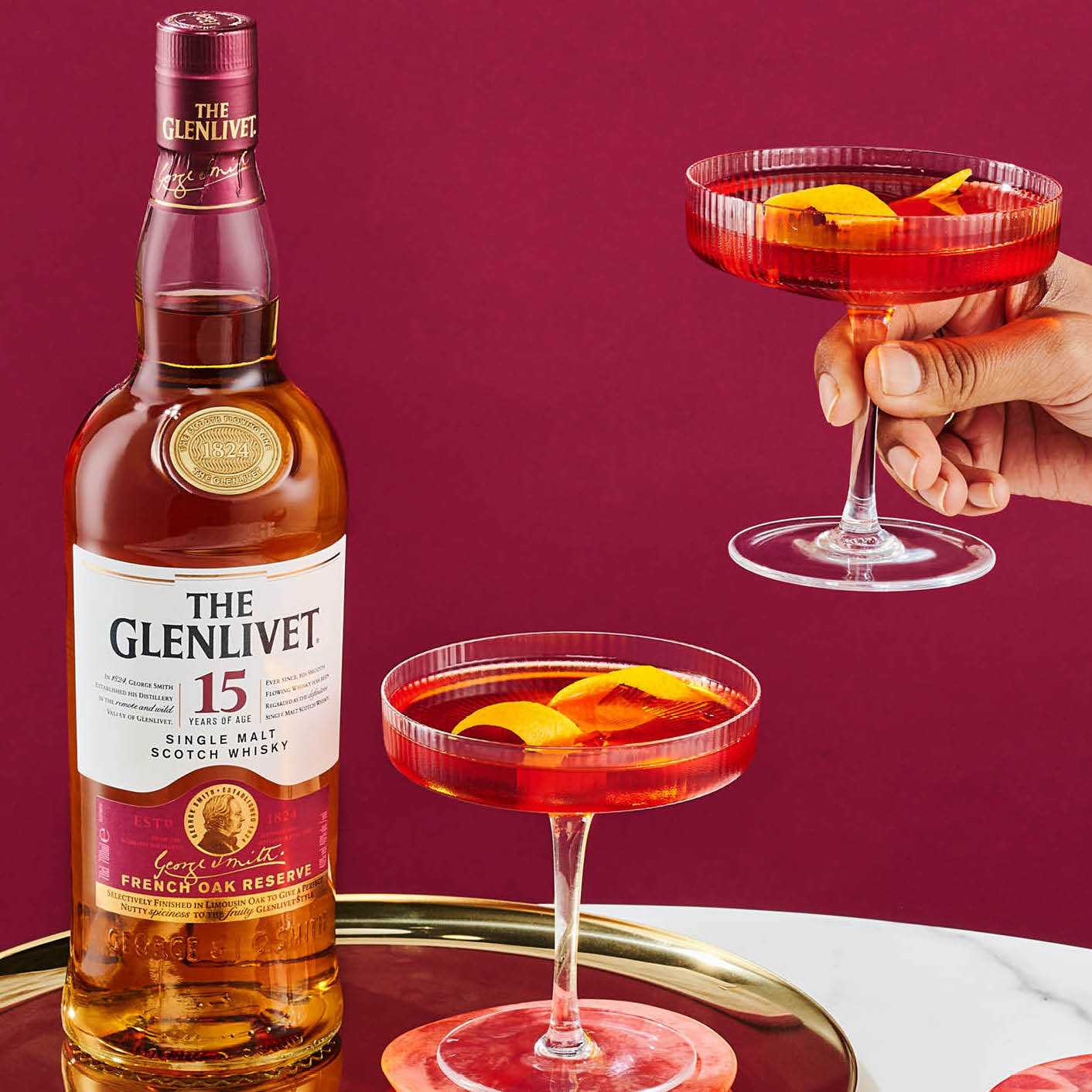 Load image into Gallery viewer, Glenlivet whisky bottle on a tray together with a couple of  cocktails