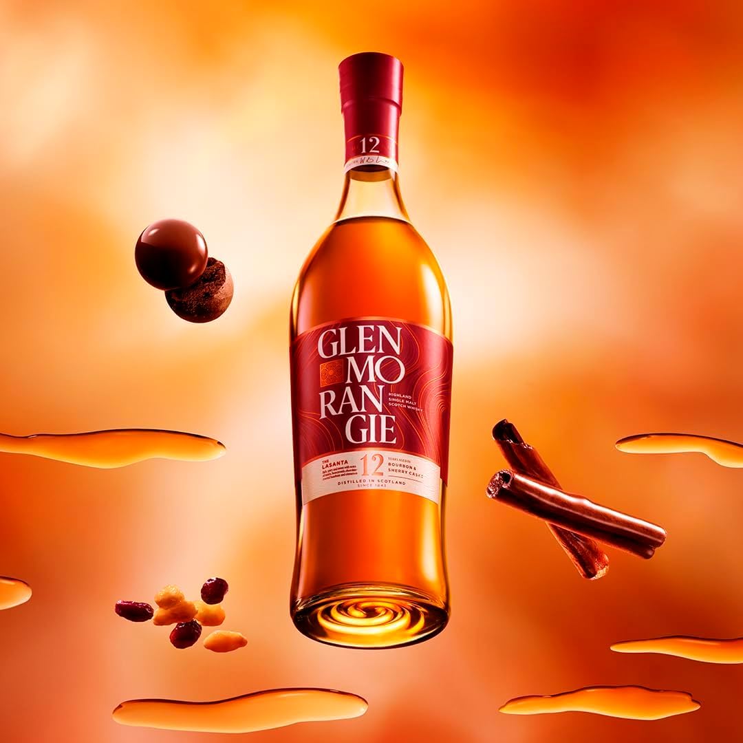 Load image into Gallery viewer, Glenmorangie The Lasanta 12 Year Old Whisky bottle with autumn elements on an orange background