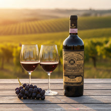 Load image into Gallery viewer, A bottle of Gran Sasso Colline Teramane Montepulciano Alta Quota wine next to two glasses with the vineyard behind.