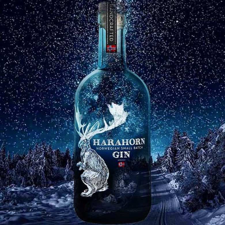 Load image into Gallery viewer, Harahorn Norwegian Small Batch Dry Gin 1000ml bottle with a winter landscape background