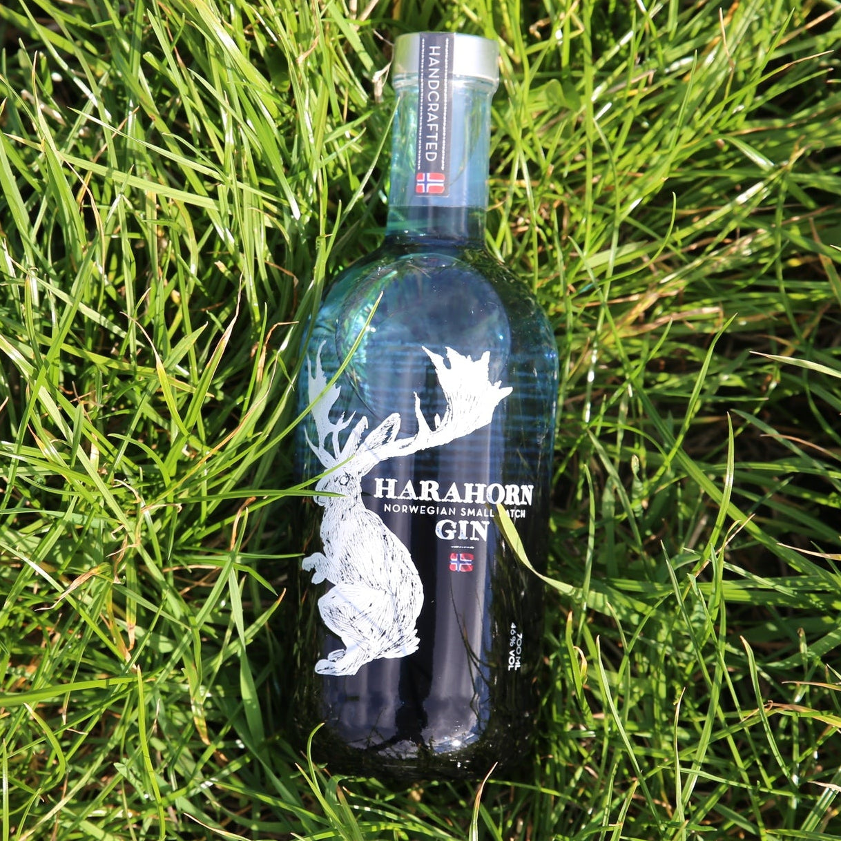 Load image into Gallery viewer, Harahorn Norwegian Dry Gin bottle on grass