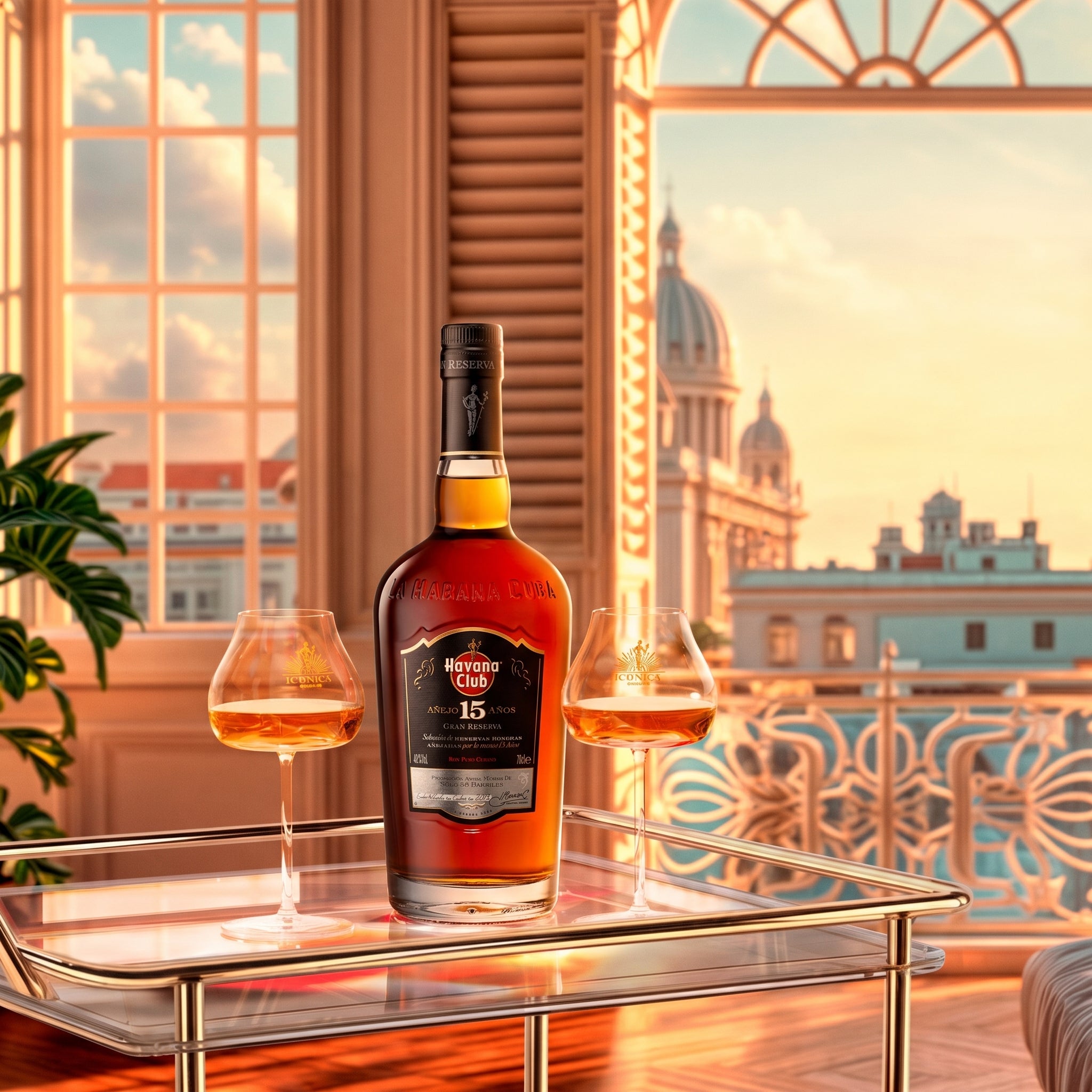 Load image into Gallery viewer, A bottle of Havana Club 15 Year Old Gran Reserva Rum is displayed on a glass table on a balcony, flanked by two filled cognac glasses, with a warm sunset view of a domed building in the background, typical Havana, Cuba setting.