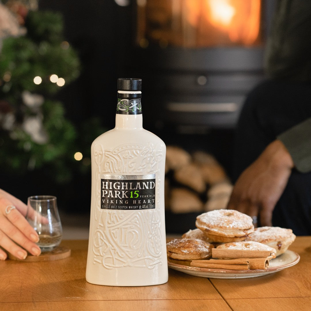 Load image into Gallery viewer, A bottle of Highland Park viking whisky on a table beside some 
Christmas mince pies infront of a Christmas tree