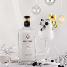 Load image into Gallery viewer, Inverroche Gin bottle with a glass of gin and tonic on a decorative table.