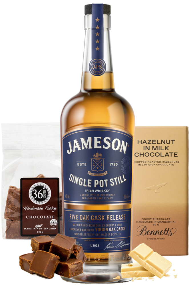 Load image into Gallery viewer, Jameson single pot still whiskey bottle with chocolate and fudge on a white background
