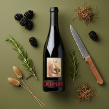 Load image into Gallery viewer, Kaesler_Old_Bastard_Shiraz wine bottle with label, knife, blackberries, and herbs on a green background