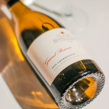 Load image into Gallery viewer, Wine bottle with a label on a white background