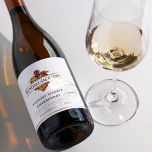 Load image into Gallery viewer, Bottle of Kendall Jackson Vintners Reserve Chardonnay with a glass of wine on a reflective surface