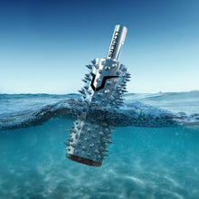 Load image into Gallery viewer, An image of a bottle of LOUERS vodka floating in water, half in half out.