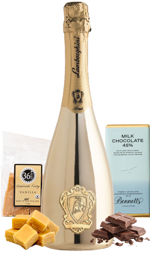 Bottle of Lamborghini spumante with chocolate, fudge, and a bar of milk chocolate on a white background