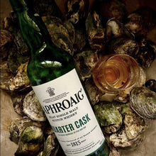 Load image into Gallery viewer, Bottle of Laphroaig-Quarter-Cask-Scotch-Whisky surrounded by oysters