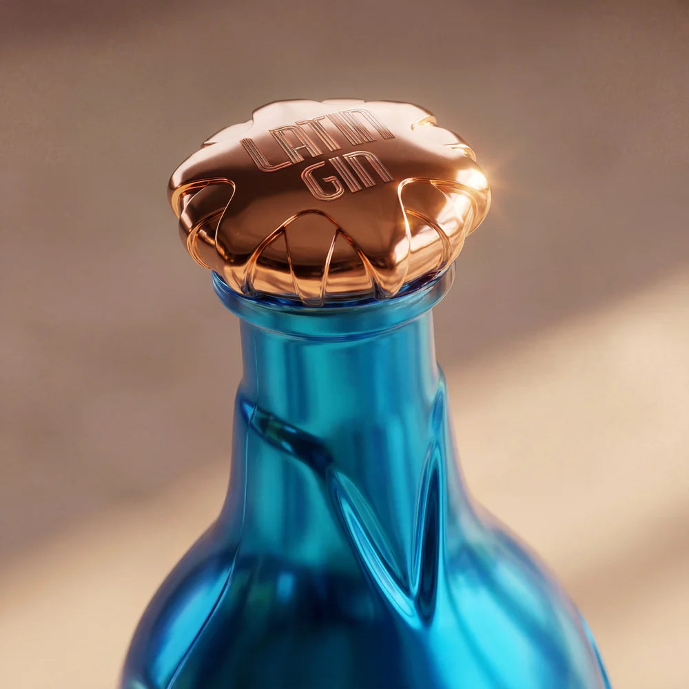Load image into Gallery viewer, The top of a bottle of Latin Beach Gin focusing on the copper cap on a gradient background