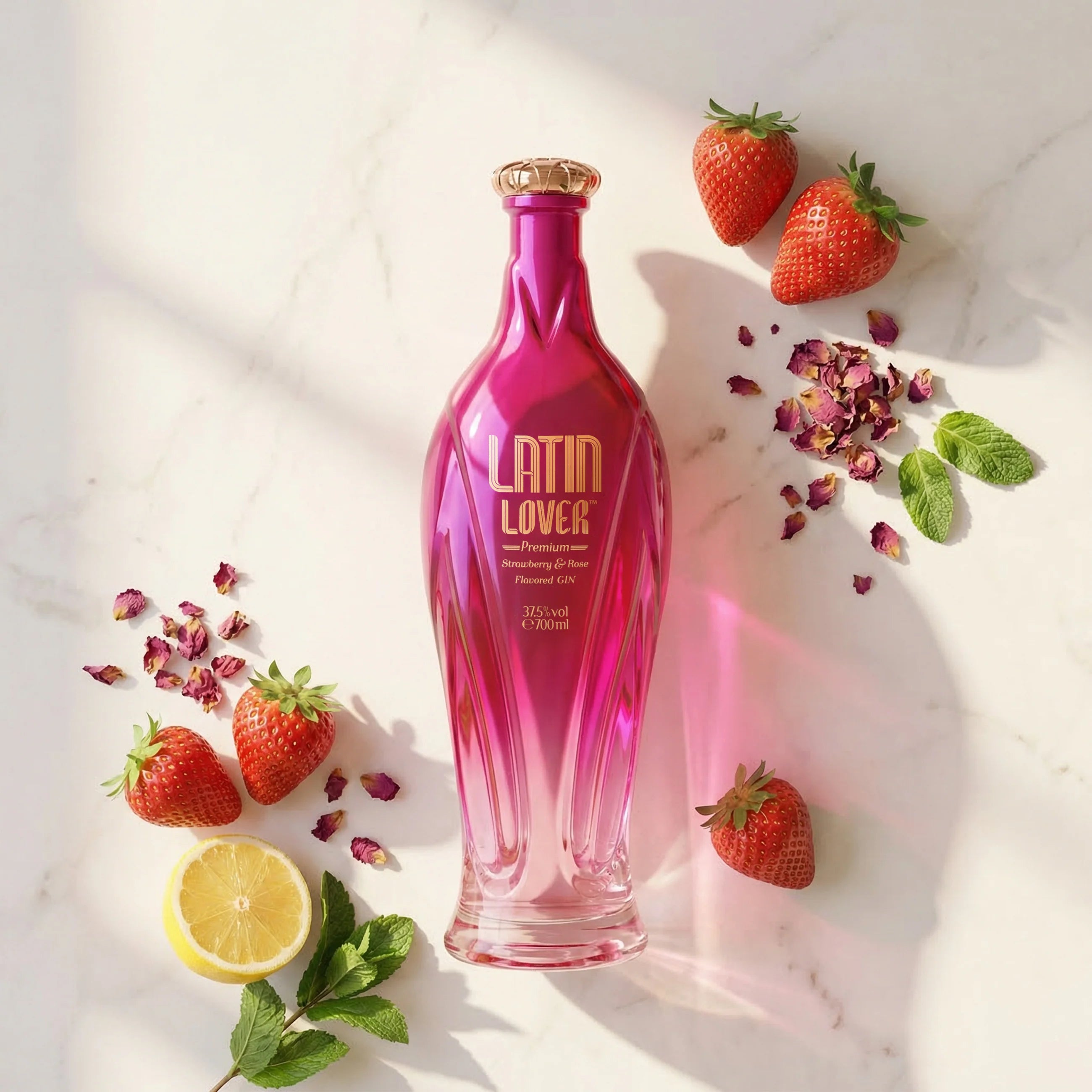 Load image into Gallery viewer, Pink Latin Lover Gin bottle with strawberries and lemon on a light background