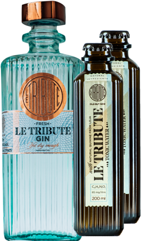 An image of a bottle of Le Tribute Gin next to two bottles of Le Tribute Tonic Waters