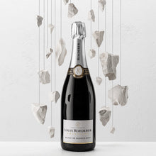 Load image into Gallery viewer, Louis Roederer champagne bottle with decorative elements on a light background