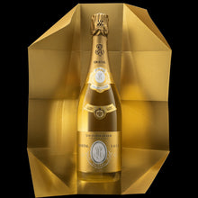 Load image into Gallery viewer, Bottle of Louis Roederer Cristal champagne in a gold packaging on a black background