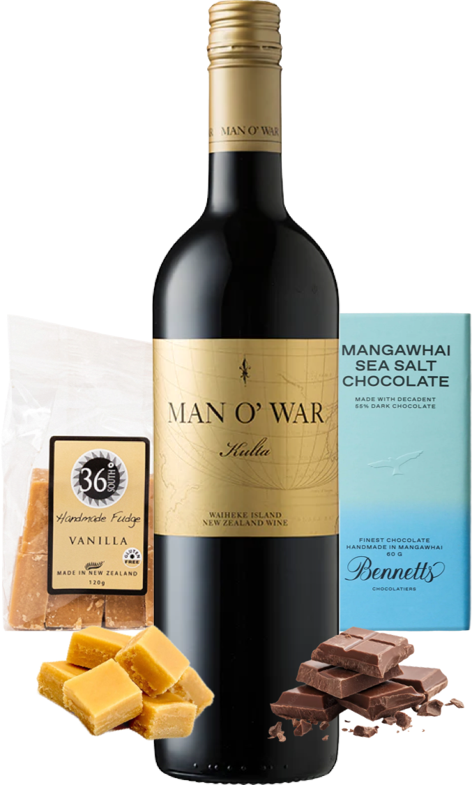 Load image into Gallery viewer, A bottle of Man O' War Kulta 'Tytti' Bordeaux Blend red wine centred on a white background, surrounded by product props including a bag of 36 Degrees Vanilla Handmade Fudge, a blue Bennett's Mangawhai Sea Salt Chocolate bar, and vanilla fudge and chocolate pieces.