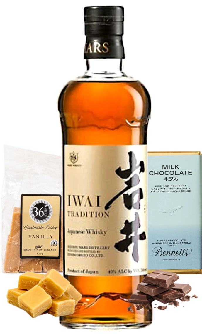 Load image into Gallery viewer, A bottle of Mars Iwai Tradition Japanese Whisky is centred on a white background, flanked by a bag of 36 Degrees Vanilla Handmade Fudge, a box of Bennett's Milk Chocolate 45%, and chocolate pieces and vanilla fudge squares.