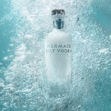 Load image into Gallery viewer, Mermaid Salt Vodka bottle underwater with bubbles