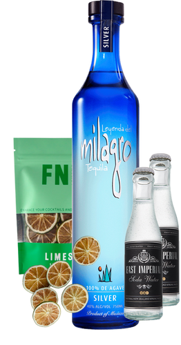 An image of a Milagro Silver Tequila Gift Box including 2 east imperial soda waters and a pouch on Lime garnish slices