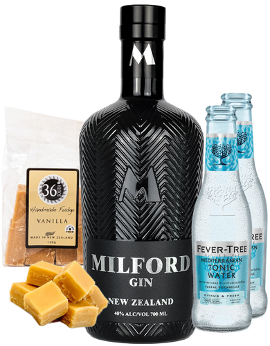 Bottle of Milford Gin with vanilla fudge, fudge pieces, and Fever-Tree tonic water on a white background