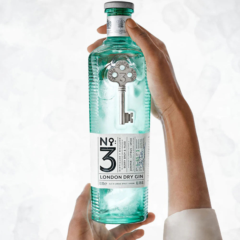 Load image into Gallery viewer, Bottle of No. 3 London Dry Gin held by a person against a white background