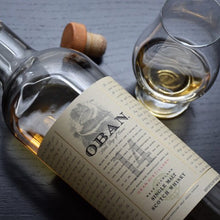 Load image into Gallery viewer, Oban whisky bottle and glass on a dark surface