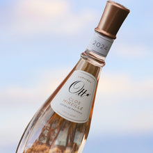 Load image into Gallery viewer, Wine bottle of Ott Clos Mireille rosewith a label on a blurred natural background