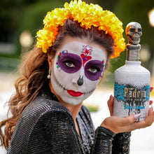 Load image into Gallery viewer, Person with Day of the Dead makeup holding a bottle of Padre-Azul-Blanco-Tequila.