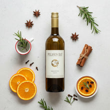 Load image into Gallery viewer, Bottle of Pegasus Bay Minuetto Sauvignon Semillon wine surrounded by oranges, cinnamon sticks, and rosemary on a light surface.