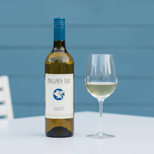 Load image into Gallery viewer, Bottle of Pegasus Bay Sauvignon Semillon Bordeaux-style blend white wine with a glass of wine on a table against a blue background