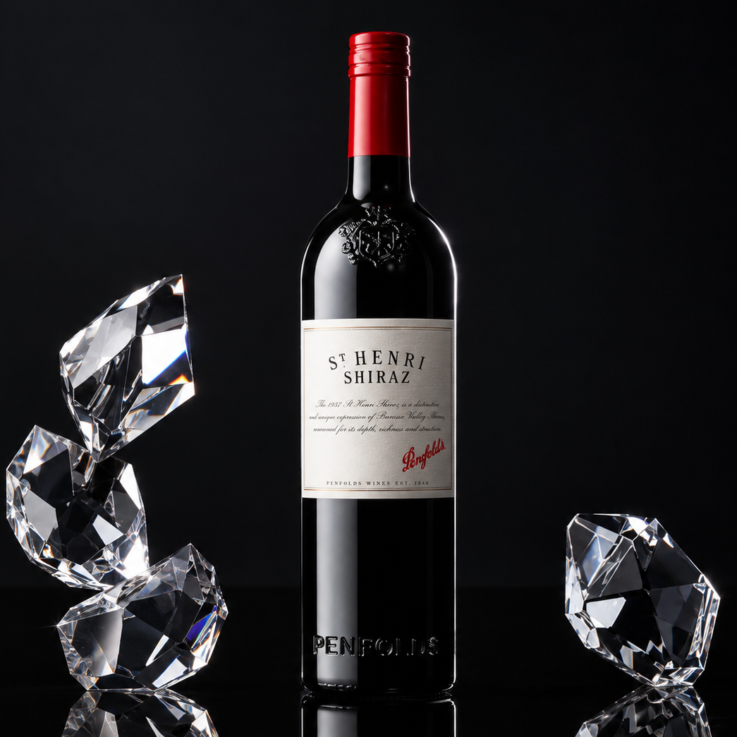 Load image into Gallery viewer, A bottle of St. Henri Shiraz red wine from the iconic brand Penfolds, styled with clear faceted crystal diamonds on a reflective black surface against a dark background.