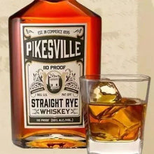 Load image into Gallery viewer, Pikesville Straight Rye Whiskey bottle with a glass of whiskey on a neutral background