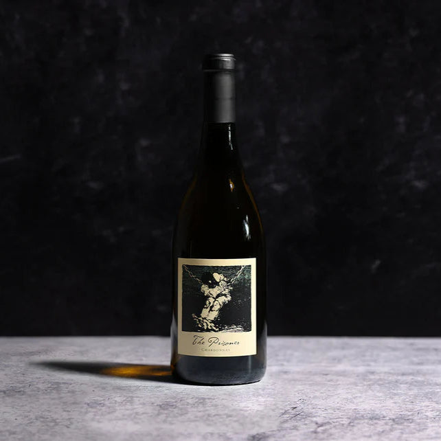Wine bottle with a label on a dark background