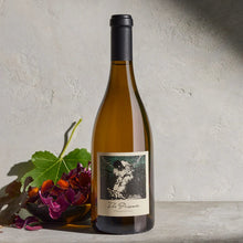 Load image into Gallery viewer, Wine bottle with a label on a light gray background