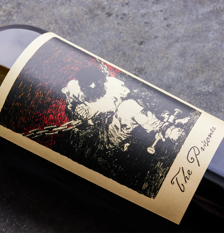 The Prisoner Red Blend wine bottle label with artistic depiction of a person and text 'The Prisoner' on a dark background