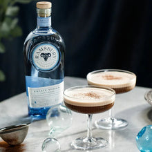 Load image into Gallery viewer, Bottle of Ramsbery Vodka with two espresso martini cocktails on a marble surface