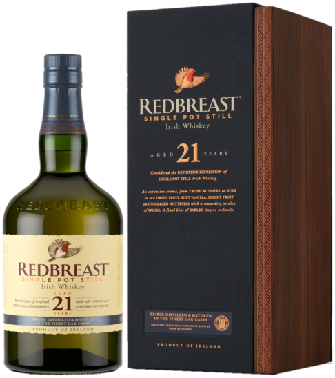 An image of a bottle of Redbreast 21 year old Irish Whiskey next to it's handsome gift box