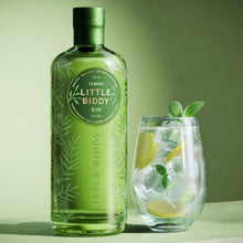 Load image into Gallery viewer, Bottle of Little Biddy Gin with a glass of gin and tonic on a green background